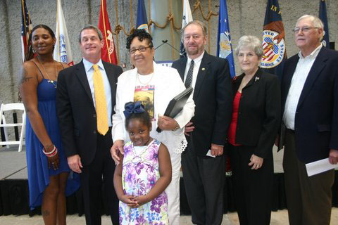 (left to right) Maria A. Carter, Senator David Vitter, Mrs. Virgie Dickerson McCorkle, Brusly Mayor Joey Normand, Council Member Joanne Bourgeois, Council Member Don Neisler.Front center: Kennis Jayla Edwards